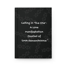 Black journal with white text on a white background